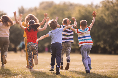 Children running away playing outside